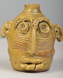 Edgefield face jug, light glaze